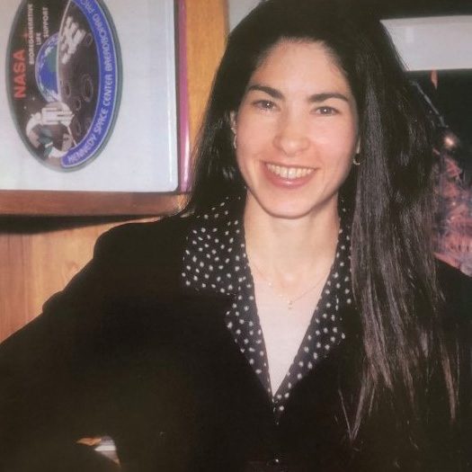 USF Graduate Dr. Anabelle Broadbent in a NASA Flight Suit